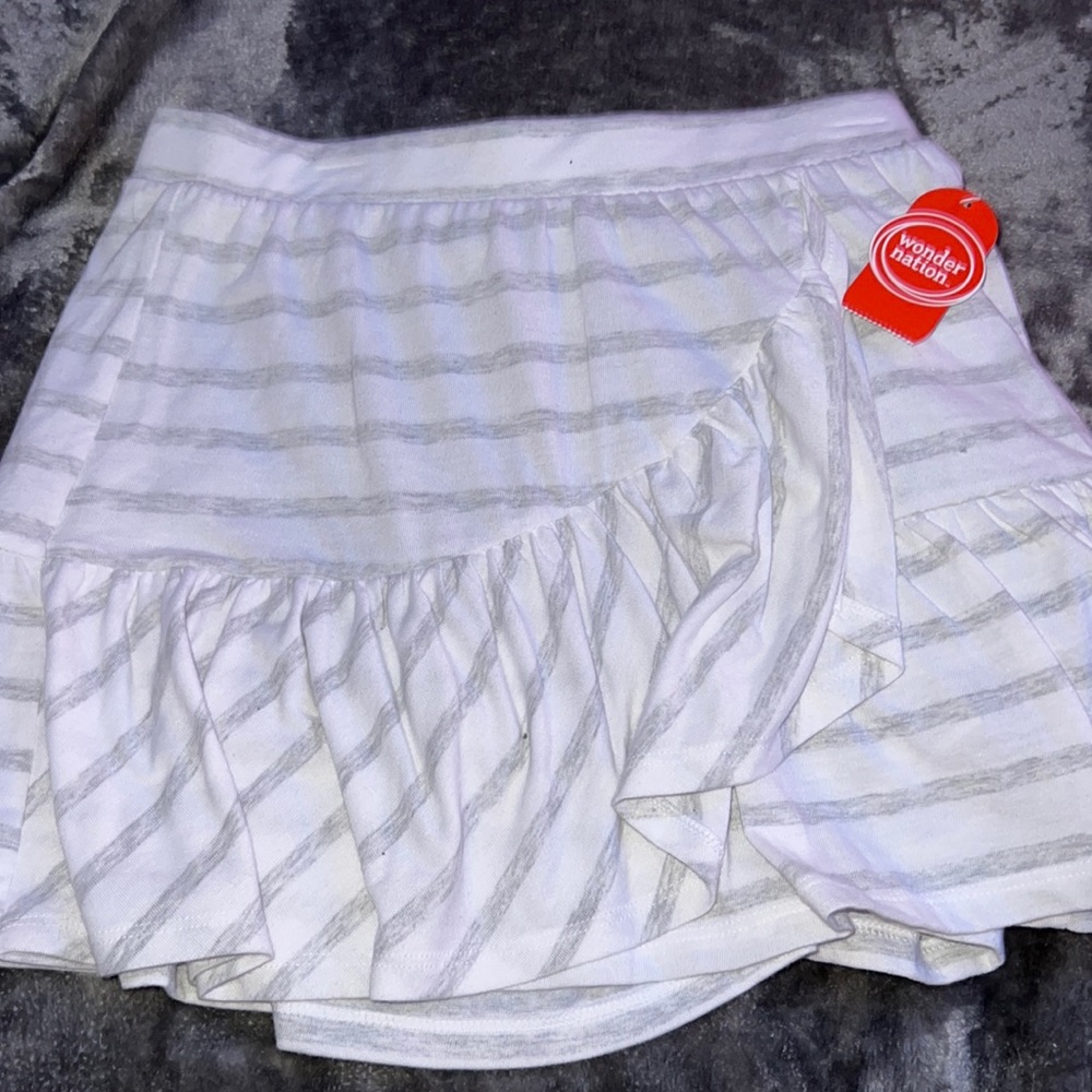 Kids size large 10/12 white and grey skirt with built in shorts